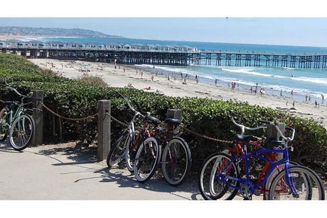 We'll watch the surfers right below us from this Pier!